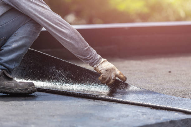 Professional Basement Waterproofing technician working in Warren, IN